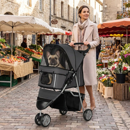 Poussette noire avec chien dans la caisse à fenêtre, capote en filet.