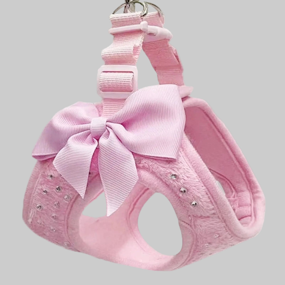 Harnais pour petit chien rose, grand nœud rayé et couture décorative sur le devant