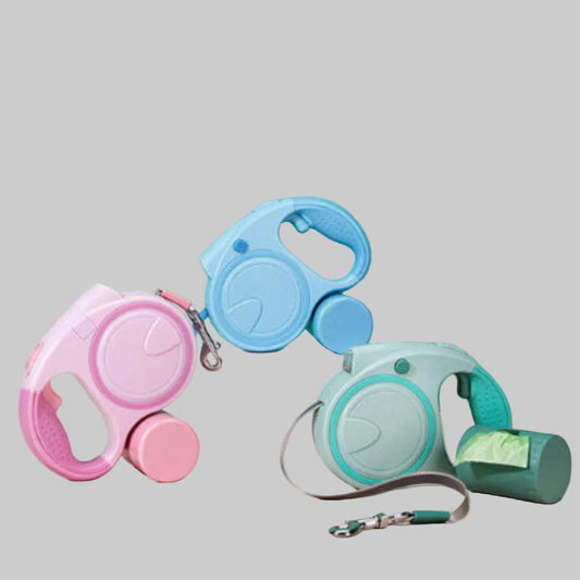 Laisse enrouleur pour chien : boîtiers rose et bleu, avec sangle rétractable