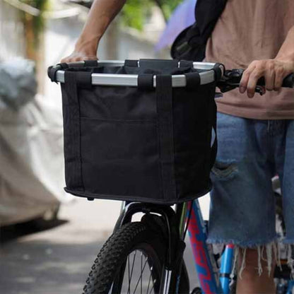 Panier de vélo pour chien noir à l’avant, attaches et cadre rigide sur le guidon