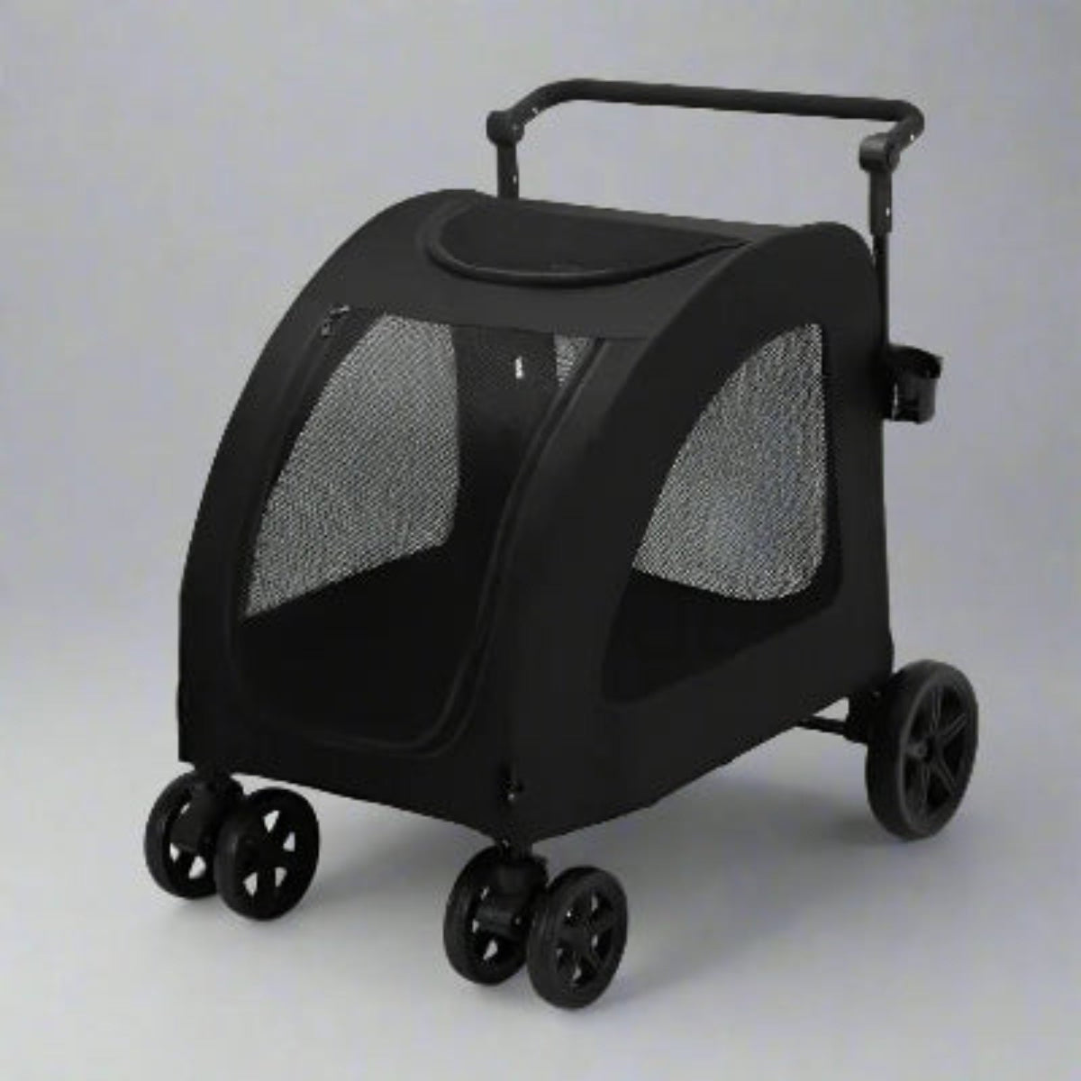 Poussette pour chien noire fermée avec panneaux en maille et poignée télescopique