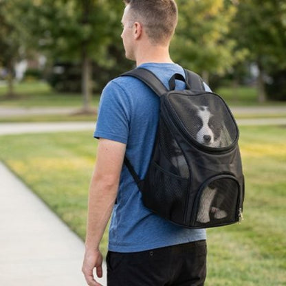 Sac à dos pour chien noir avec fenêtre ovale en mesh et ouverture zippée.