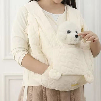 Sac de transport pour petit chien blanc matelassé, ouverture avant et poche.