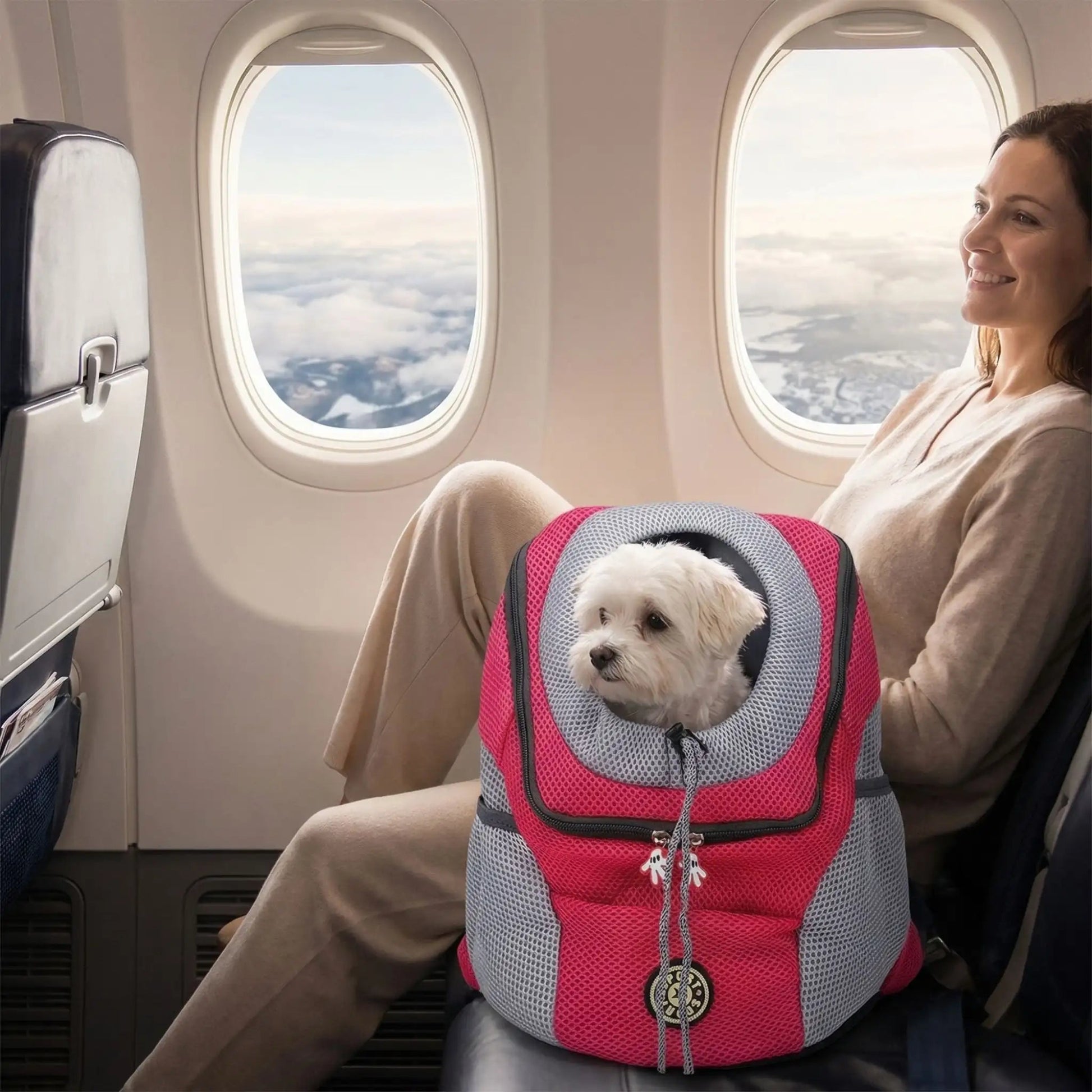 Sac pour chien cabine rose et gris, ouverture ronde et fermeture à cordon, en avion