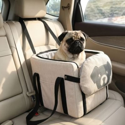 Sac de transport pour chien beige clair, sangles noires et tête de chien sur le côté